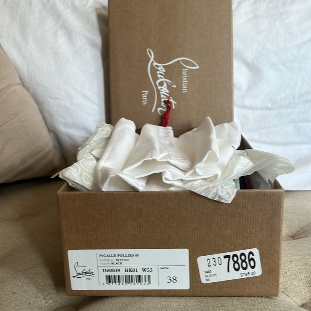 Black Christian louboutin heels, never worn